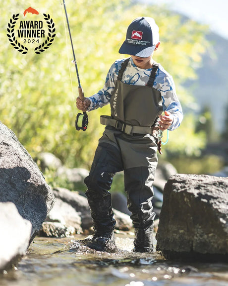 Person wearing waders and a cap, holding a fishing rod, standing in a stream with an 'Award Winner 2024' badge in the corner.