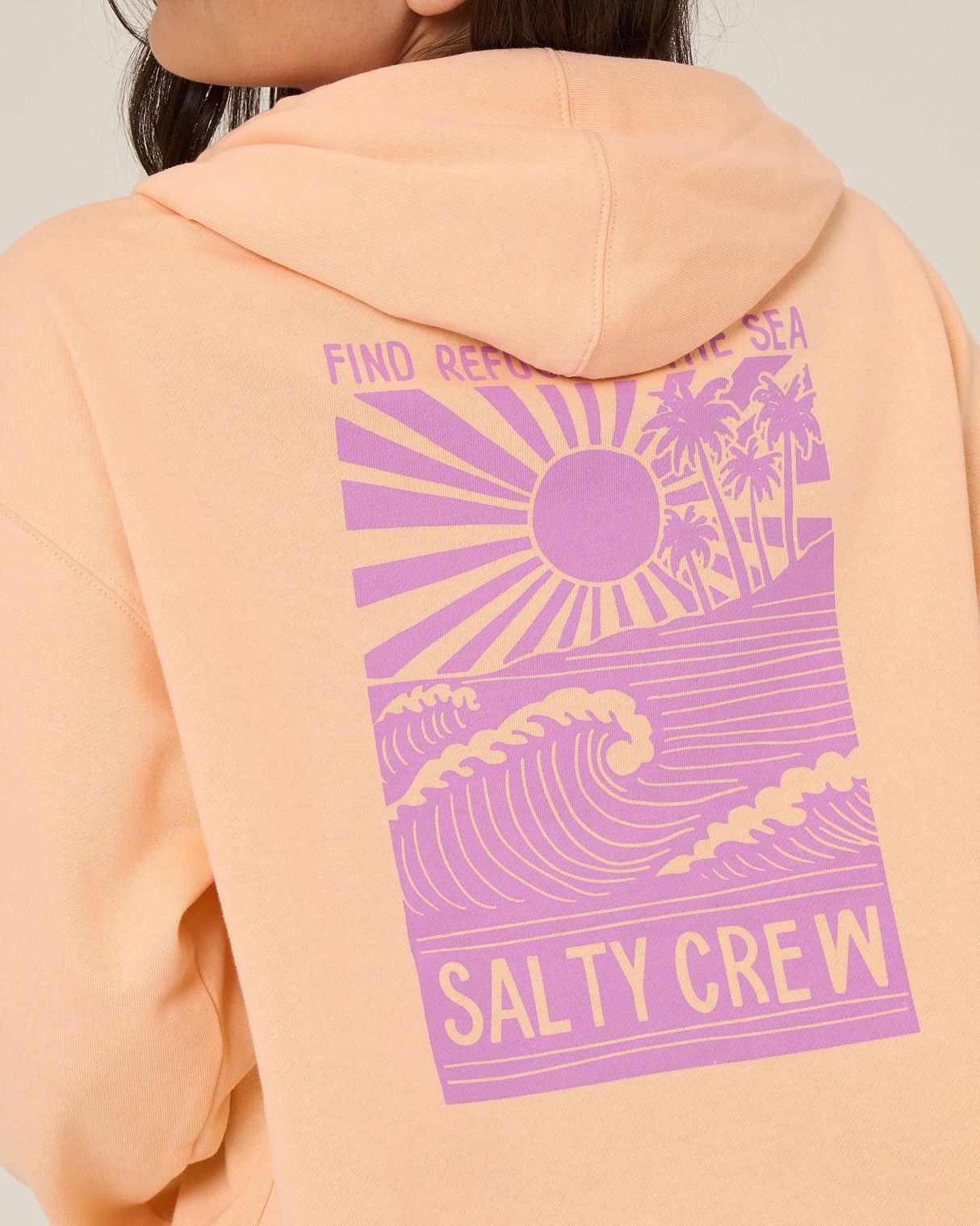 Close up back view of the Rise And Smile Hoodie - Apricot.