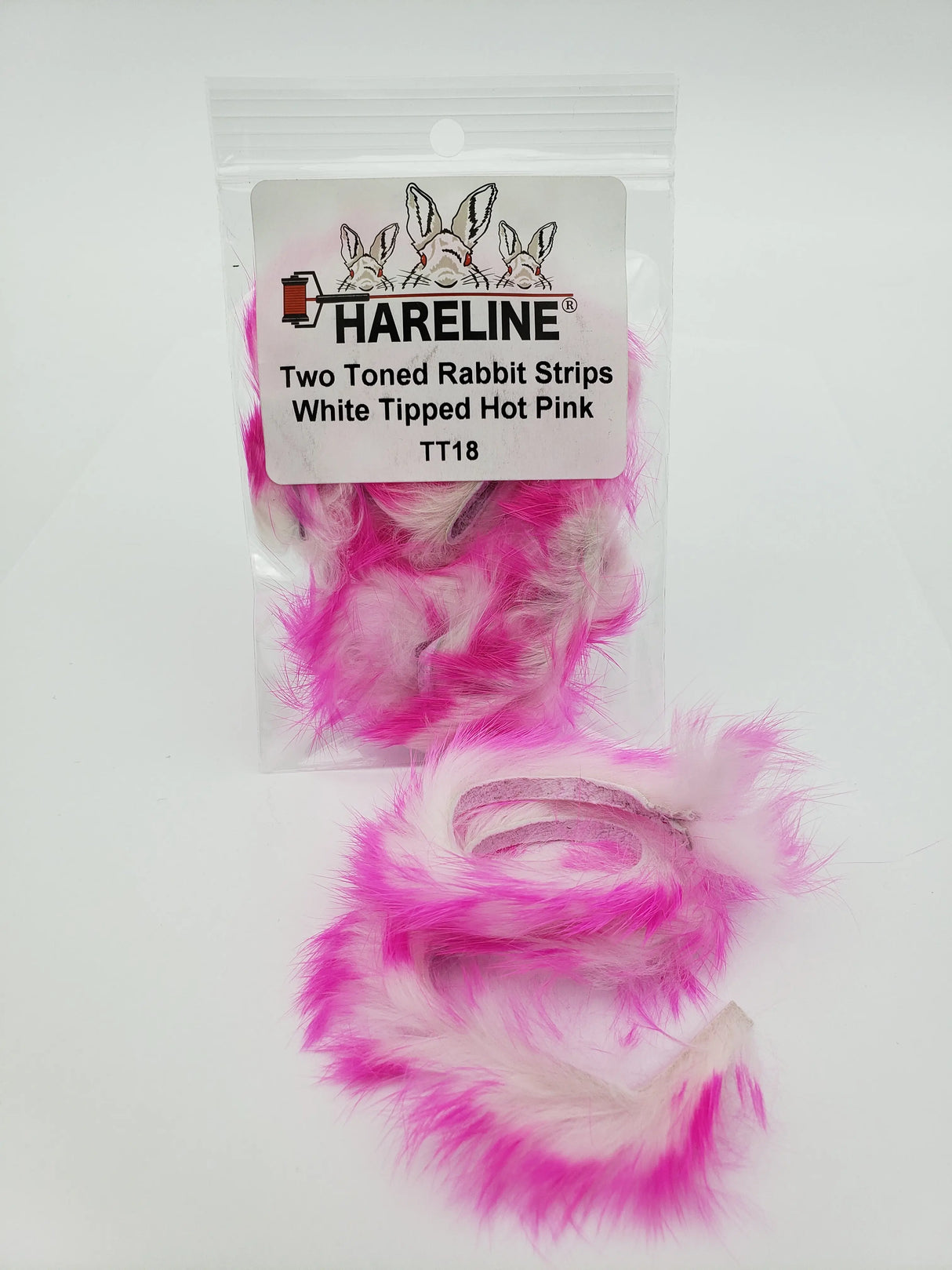 Hareline Two-Toned Rabbit Strips - White Tipped Hot Pink Hareline Dubbin