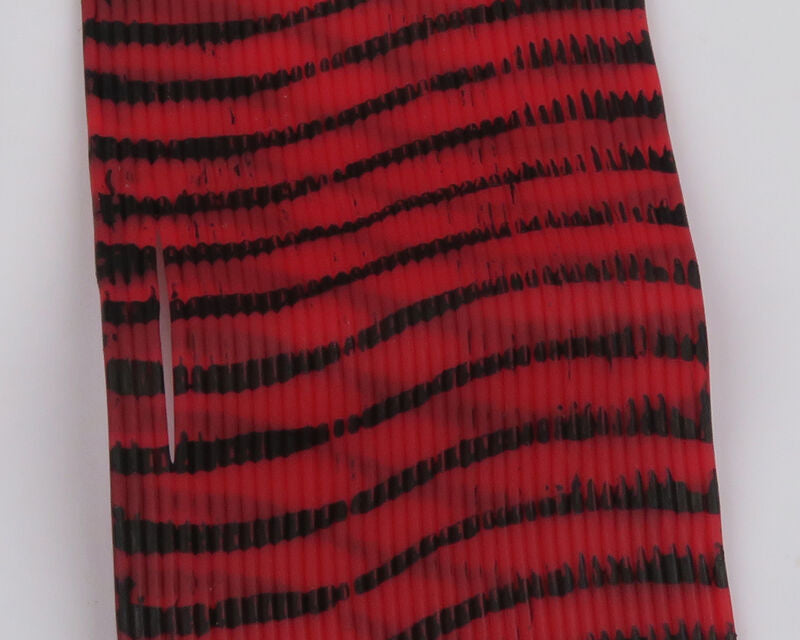 Red and black striped fabric on a white background