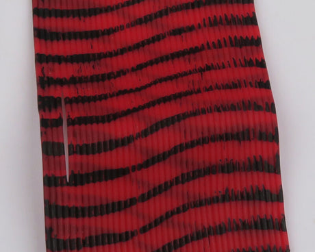 Red and black striped fabric on a white background