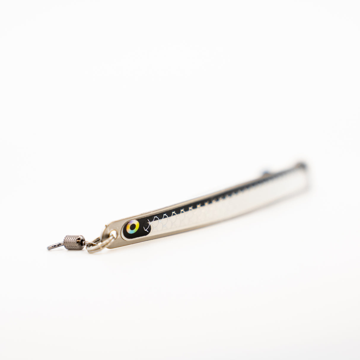 Thunder Spoon 4 inch salmon trolling spoon in silver scale finish with glow eye detail and premium stainless hardware, made in BC