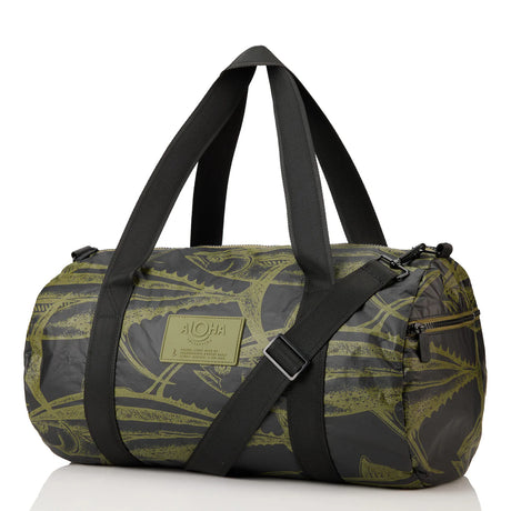 Green and black patterned duffel bag with a strap on a white background
