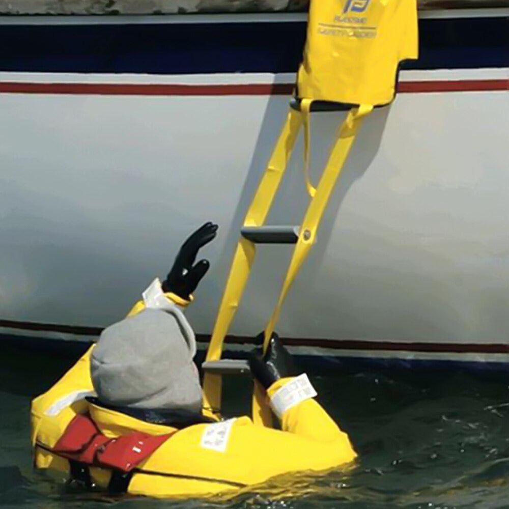 Plastimo Safety Ladder deployed alongside a boat, providing safe emergency reboarding from the water.