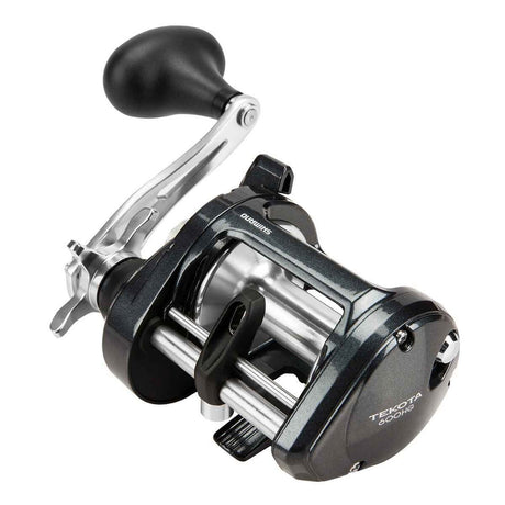 Angled view of Shimano Tekota A conventional reel showing frame and spool design