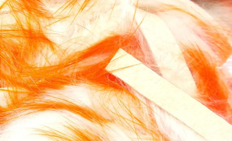 Hareline Two-Toned Rabbit Strips - Hot Orange Tipped White Hareline Dubbin