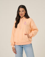Front view of the Rise And Smile Hoodie - Apricot. 