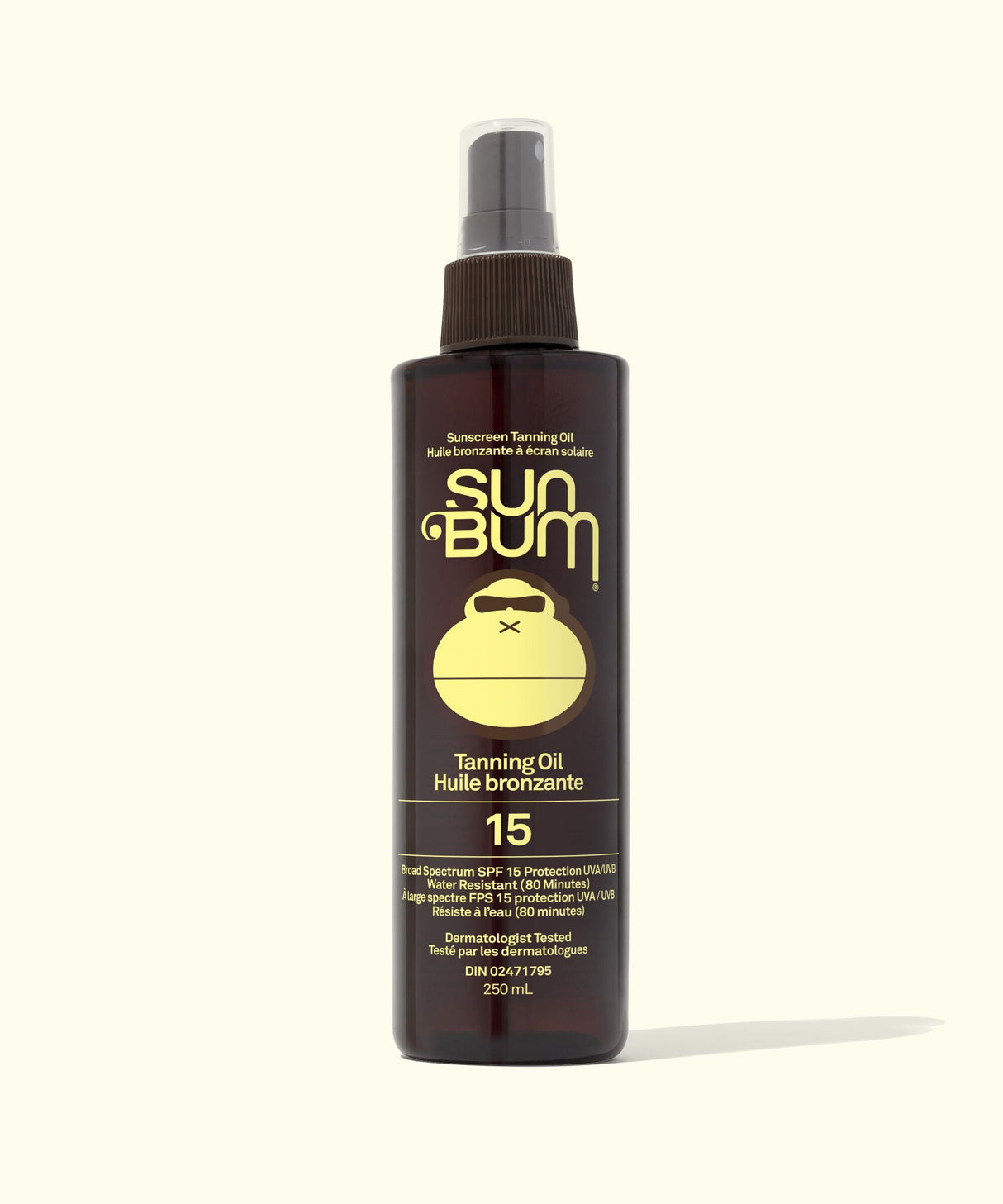 Sun Bum tanning oil spray bottle on a white background