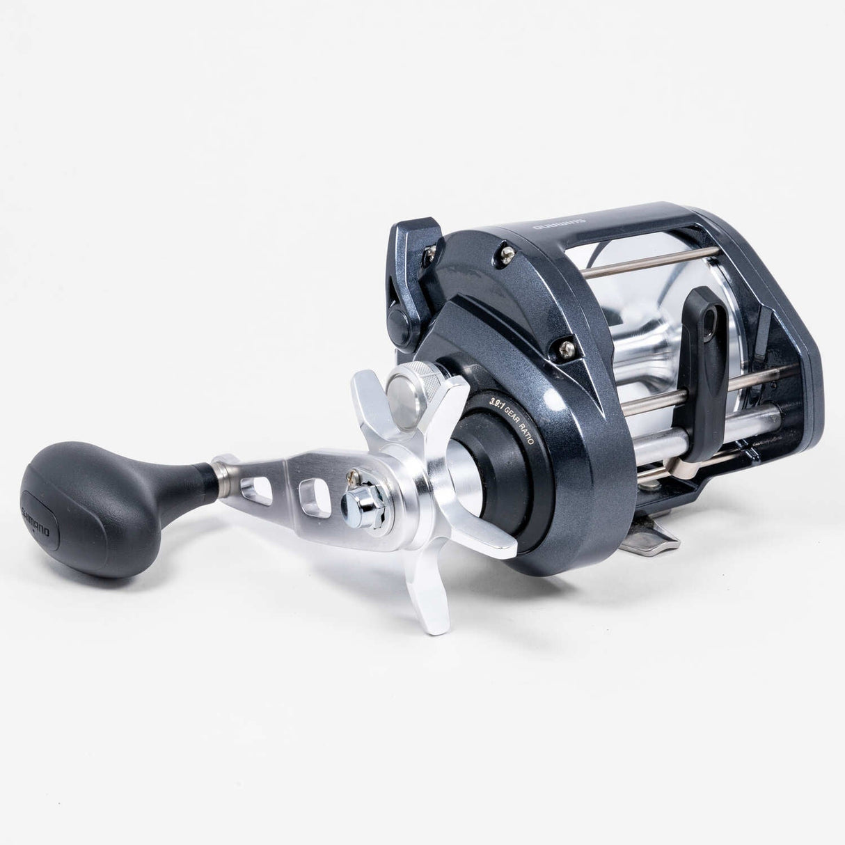 Angled view of Shimano Tekota A conventional reel showing handle and frame design