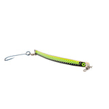 Fishing lure with a green and black pattern on a white background