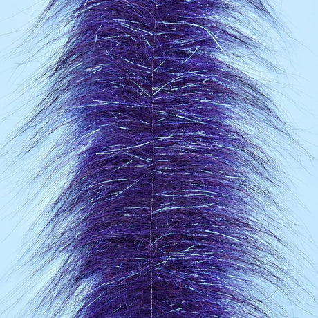 Close-up of a purple and white feather on a light blue background