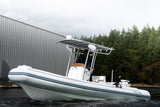 AB Inflatables 21 Oceanus VST under way past a forested shoreline