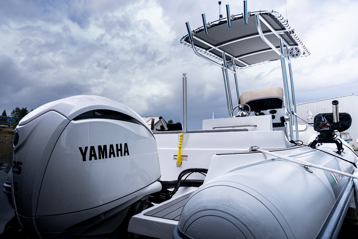 Yamaha outboard on the stern of the AB Inflatables 21 Oceanus VST, with the T-top behind
