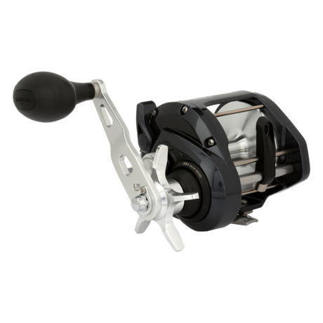 Shimano Tekota A conventional trolling reel close-up with power handle, black and silver
