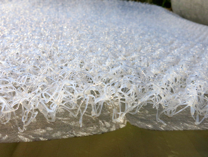 Close-up side profile of HyperVent mattress ventilation underlay showing the open-loop polymer structure that creates airflow beneath boat, RV, camper van, and cabin mattresses to reduce condensation.
