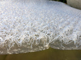 Close-up side profile of HyperVent mattress ventilation underlay showing the open-loop polymer structure that creates airflow beneath boat, RV, camper van, and cabin mattresses to reduce condensation.